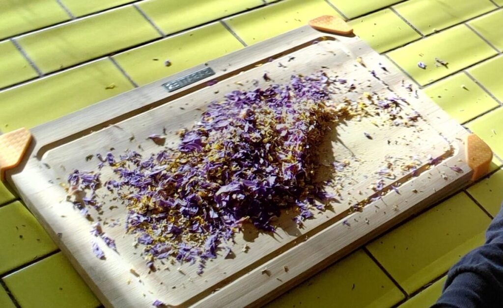 Chopped Blue Lotus Flower on a cutting board