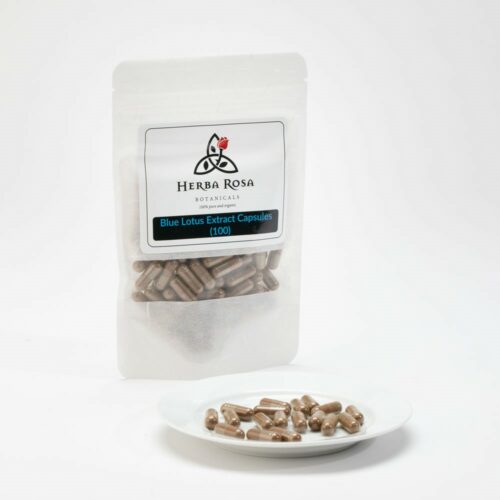 A bag of Blue Lotus extract capsules with a few of the capsules sitting on a small plate in front.