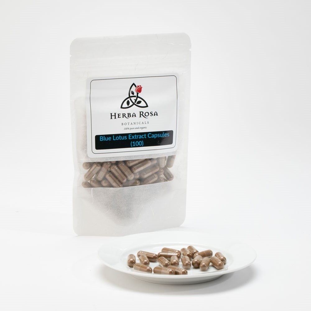 A bag of Blue Lotus extract capsules with a few of the capsules sitting on a small plate in front.